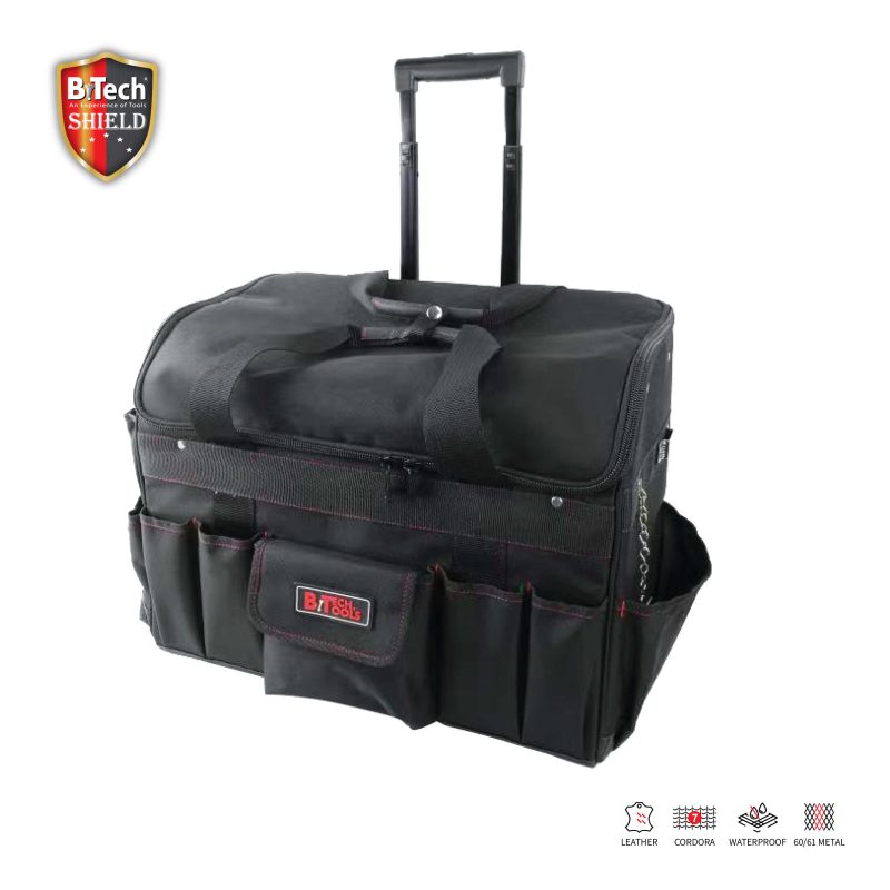 ארגונית כלי עבודה 32" טרולי SHIELD של B.Tech דגם No.34 6M.K — התיק הגדול בישראל — במבט תלת-רבעי — תיק עבודה ענק שחור על גלגלים עם ידית תלסקופית שחורה מובנית בגב, חזית מלאה ברצועות לכלי-יד (מפתחות, מברגים, סכינים, מדידות) עם 6 כיסים מרכזיים ורחבים, ידית אחיזה עליונה נוספת לסחיבה קרובה ולוגו BiTech Tools אדום. מק"ט 0503897 — לשיפוצניקים מקצועיים המעבירים מערכות שלמות בין אתרים.